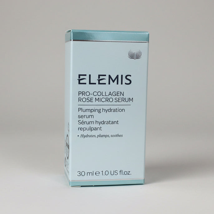 ELEMIS skincare serum packaging on a reflective surface with a neutral background
